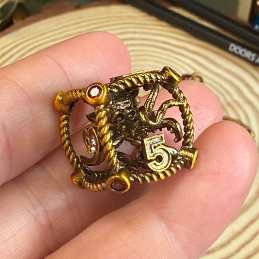 Hollow Octopus Cage 7 Piece Metal Poly Dice Set - The Wandering Satchel