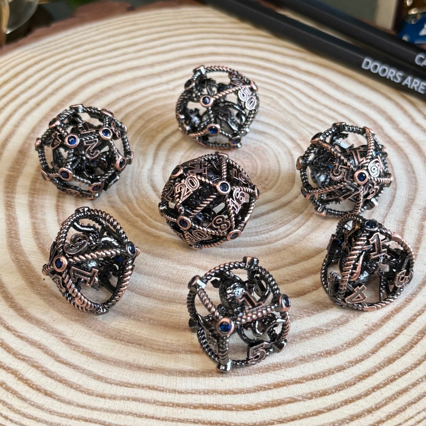 Hollow Octopus Cage 7 Piece Metal Poly Dice Set - The Wandering Satchel