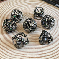 Hollow Octopus Cage 7 Piece Metal Poly Dice Set - The Wandering Satchel