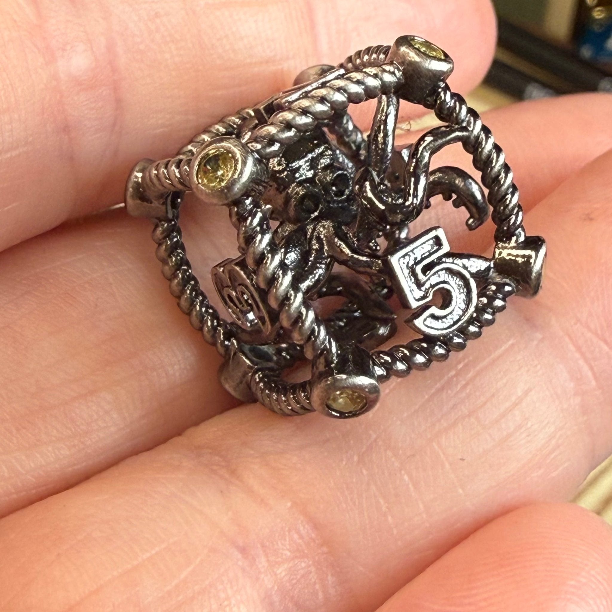 Hollow Octopus Cage 7 Piece Metal Poly Dice Set - The Wandering Satchel