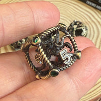 Hollow Octopus Cage 7 Piece Metal Poly Dice Set - The Wandering Satchel